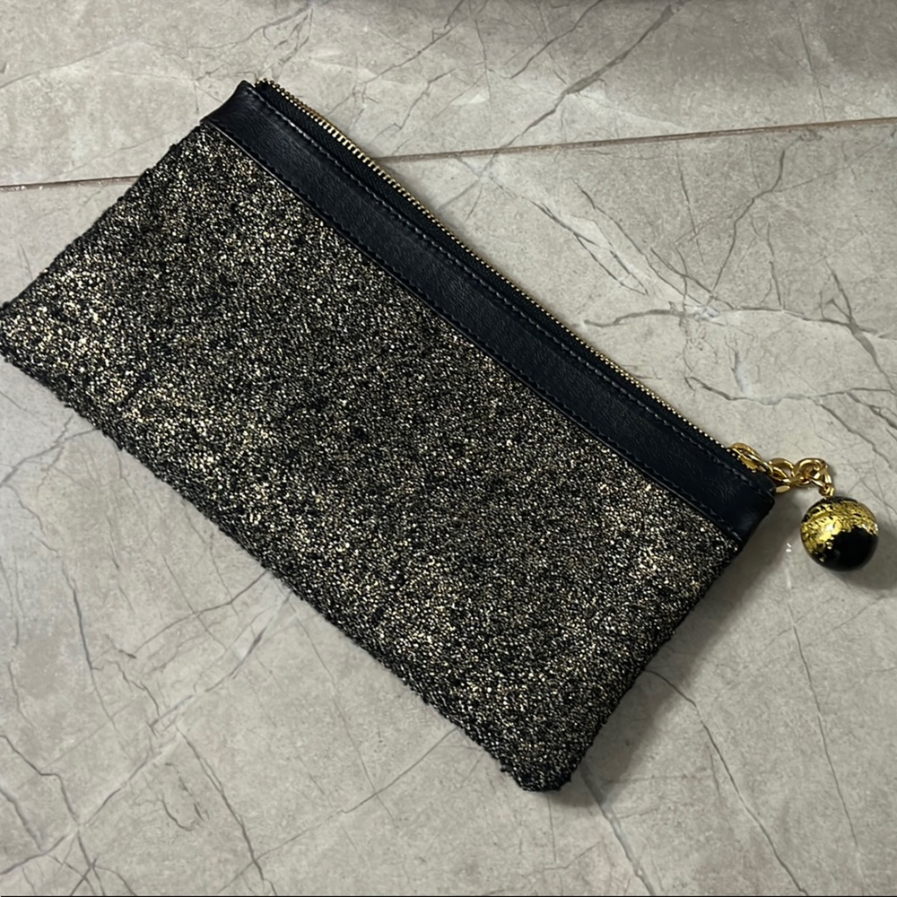 Una Ella Volta Black and Gold Clutch